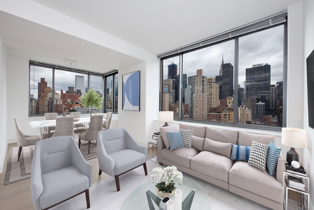 Living room at The Anthem with Manhattan skyline views